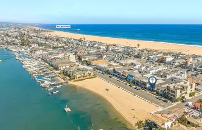 an aerial view of a beach and a city at Spacious 3Br Bayfront W Harbor Views, Walk To Beach By Beachview Rentals in Newport Beach