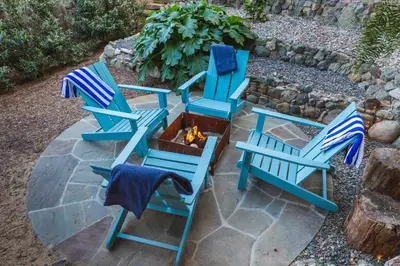 a group of blue chairs sitting on a patio at The Lantern House, Walk to Harbor, Great Outdoors in Dana Point