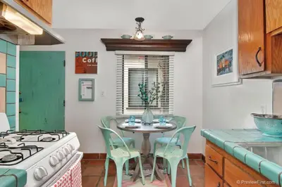 a kitchen with a table with chairs and a stove at Old Town 1BR Short Drive to Downtown and Beaches 4.5 in San Diego