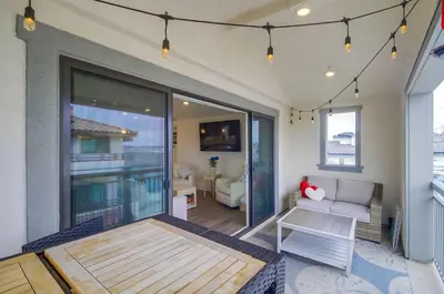 a living room with a couch and a table at Bayside Cove 10 in San Diego