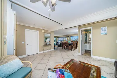 a living room with a couch and a table at Ocean Vista Penthouse 2 in San Diego