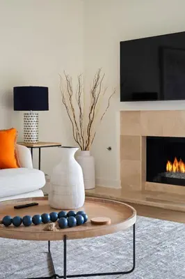 a living room with a couch and a fireplace at La Jolla Hillside Views and Coastal Comfort in San Diego