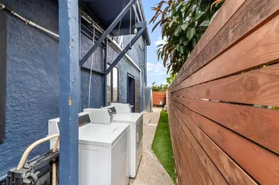 a row of toilets sitting outside of a building at Charming Gem in LH, High Speed WiFi Minutes from Beach, Downtown & Petco Park! in San Diego