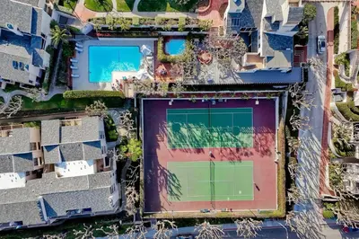 an overhead view of a building with a soccer field at Aqua Luxe - SUR113 in Solana Beach