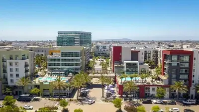 an aerial view of a city with palm trees and buildings at Vive on The Park in San Diego
