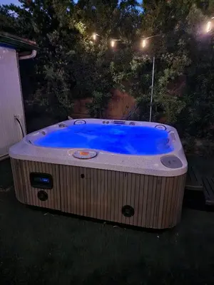 a large hot tub in the yard at night at Sunny Retreat Beaches Lakes Trails in La Mesa
