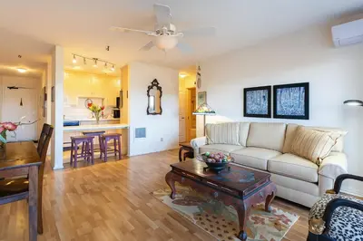 a living room with a couch and a table at #Marbella Lane - Bayfront Bliss Sunset Views & Pool in San Diego