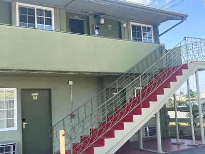 a staircase on the side of a building at Star Motel in San Diego