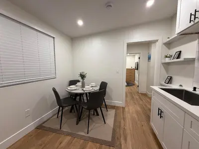 a kitchen and dining room with a table and chairs at Beautiful cozy home in San Diego in San Diego