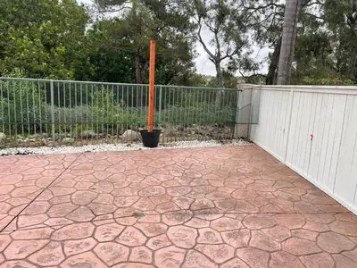 a patio with a fence and a pole at Family-Friendly Sunny SD Escape, Sleeps 8, Beach, Zoo, Downtown & Convention Center in San Diego