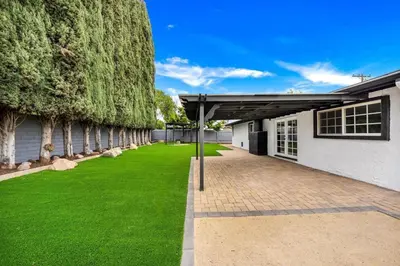 an image of a house with a green lawn at Xlnc Exotic home Poway in Poway