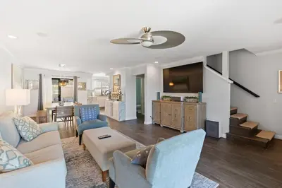 a living room with a couch and a table at Carlsbad's Hidden Escape in Carlsbad