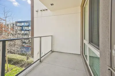 a balcony with a view of a building at Global Luxury Suites Mission Valley East in San Diego