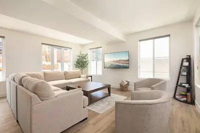 a living room with a couch and two chairs and a table at Ocean Beach Getaway with Peek Views in San Diego