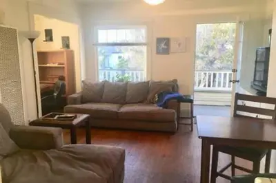 a living room with a couch and a table at Great for extended stays in San Diego