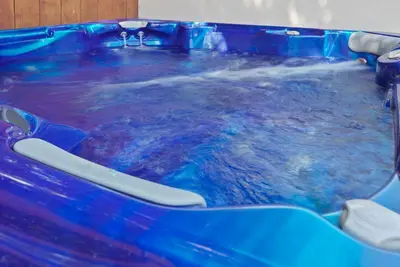 a blue tub filled with water in at Stunning La Jolla Hideaway Close to Everything in San Diego