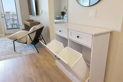 a room with a desk and a chair and a mirror at North Park Modern 2BR King Beds, Workspaces, Parking in San Diego