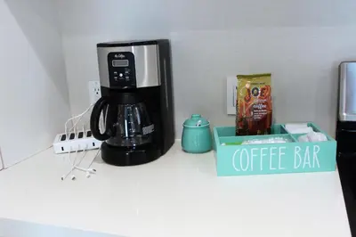 a coffee maker sitting on top of a counter at Steps from Ocean! Ocean and Bay Views! Rooftop Deck! Two-Car Garage! Renovated! in San Diego