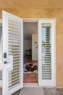 a door leading into a room with a window at Private Encinitas Casita & Patio in Encinitas