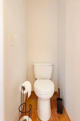 a bathroom with a white toilet in a room at Private Encinitas Casita & Patio in Encinitas