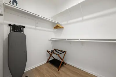 a room with a closet with a shelf at NEW LUX Modern Retreat Views Parking Workspaces in San Diego