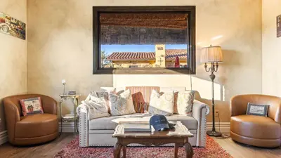 a living room with a couch and two chairs at Soaking Tub Vineyard Views Wine Trail Access The Casita at Vines Estate by AvantStay in Temecula
