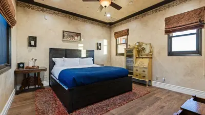 a bedroom with a bed and a dresser in it at Soaking Tub Vineyard Views Wine Trail Access The Casita at Vines Estate by AvantStay in Temecula