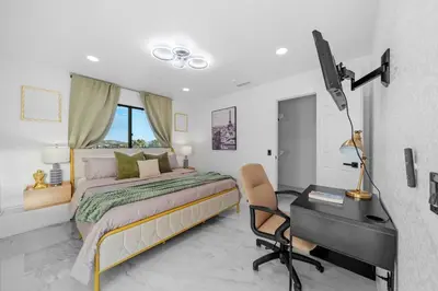 a bedroom with a bed and a desk and a computer at Entire Private Home with 3 Bedrooms 2 Bathrooms, Mountain View, Jetted Tub, 2500 sqft, King Bed,Garage, Available Now in Jamul