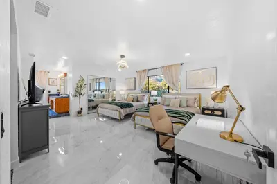 a living room with a couch and a bed and a table at Entire Private Home with 3 Bedrooms 2 Bathrooms, Mountain View, Jetted Tub, 2500 sqft, King Bed,Garage, Available Now in Jamul