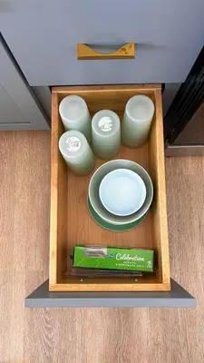a wooden box with a set of dishes and a plate at San Diego Oasis Fire Pit, Putting Green, Near Everything in San Diego