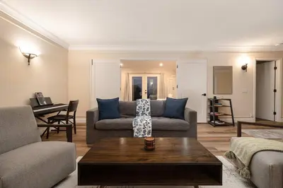 a living room with a couch and a table at Luxury Home OceanView in San Diego