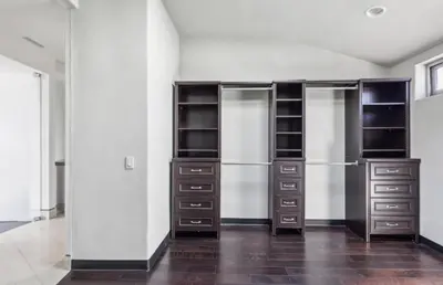 a room with three refrigerators and a wall at The Wave House! Custom Gem with Panoramic Views, Fire Pit, BBQ, Pool Table in San Diego