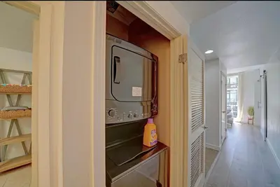 a kitchen with a microwave sitting on a counter at Gaslamp District Heart of San Diego in San Diego