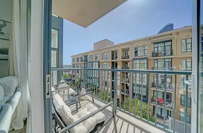 a balcony with a view of a building at Gaslamp District Heart of San Diego in San Diego