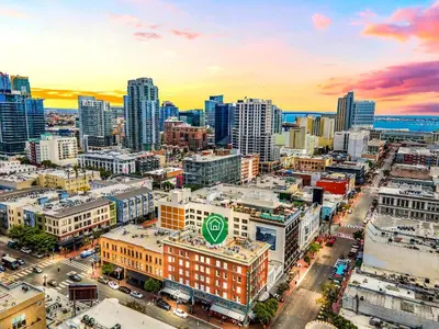 an aerial view of a city with tall buildings at The Historic Penn Hotel in San Diego
