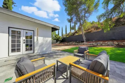 a patio with two lounge chairs and a table at Xlnc Exotic Home Witt Rd Poway in Poway