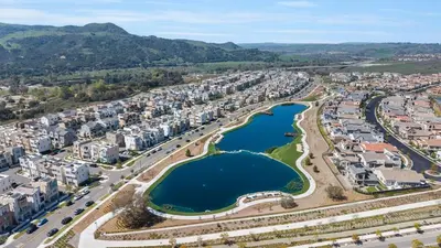 an aerial view of a city with a lake at Luxury Oasis Resort Pool&Spa Fitness Arcade in Ladera Ranch