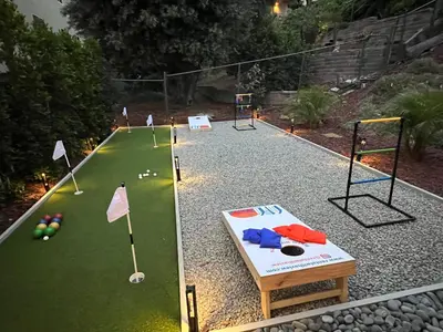 a miniature golf course with a table and golf balls at Lux Escape 1 • Views Hot Tub Games Mini Golf in San Diego