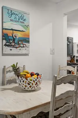 a bowl of fruit on a table in a kitchen at 2br Pet-Friendly Oceanside Home in Oceanside