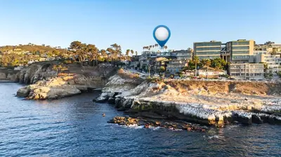 a hot air balloon flying over a body of water at New Modern Studio - Stunning Ocean view in San Diego