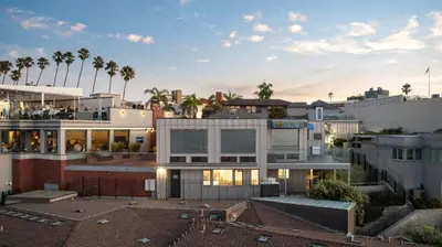 an aerial view of a building with palm trees at New Modern Studio - Stunning Ocean view in San Diego