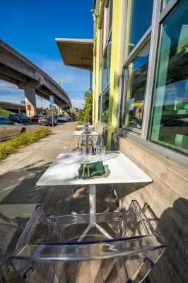 a table set up outside of a building at Hotel Narcissus - Room 3 in San Diego
