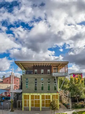 a building with a balcony on top of it at Hotel Narcissus - Room 5 in San Diego