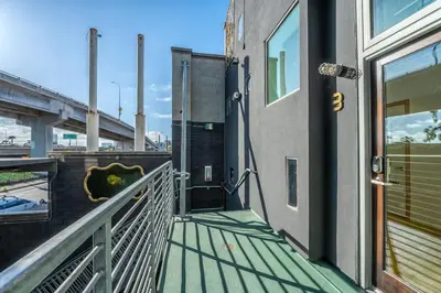 a balcony of a building with a view of a bridge at Hotel Narcissus - Room 6 in San Diego