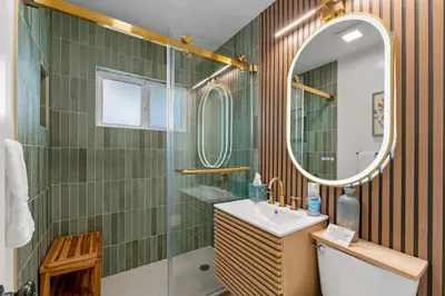 a bathroom with a sink and a mirror at Cozy San Diego Hideaway in Historic Mission Hills in San Diego