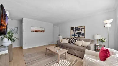 a living room with a couch and a table at Cozy San Diego Hideaway in Historic Mission Hills in San Diego