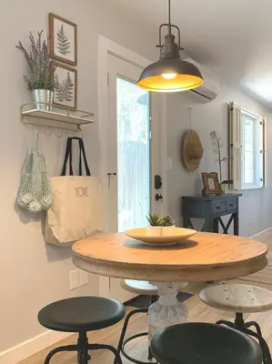 a dining room with a wooden table and chairs at New cozy studio 2 queen beds kitchen walk to water! in San Diego