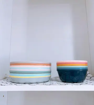 two colorful bowls sitting on top of a shelf at Modern Cozy Stylish Home AC WasherDryer Parking 3 minutes to Balboa Park in San Diego