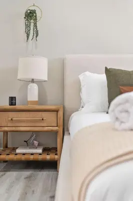 a bedroom with a bed and a table with a lamp at Wellness Bnb - Your San Diego Retreat in San Diego
