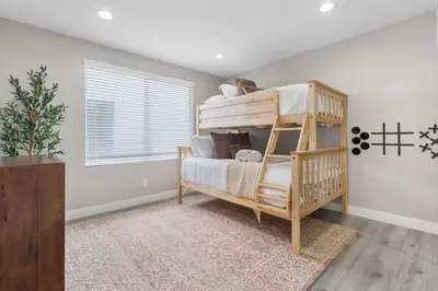 a bedroom with a bunk bed in a room at Wellness Bnb - Your San Diego Retreat in San Diego